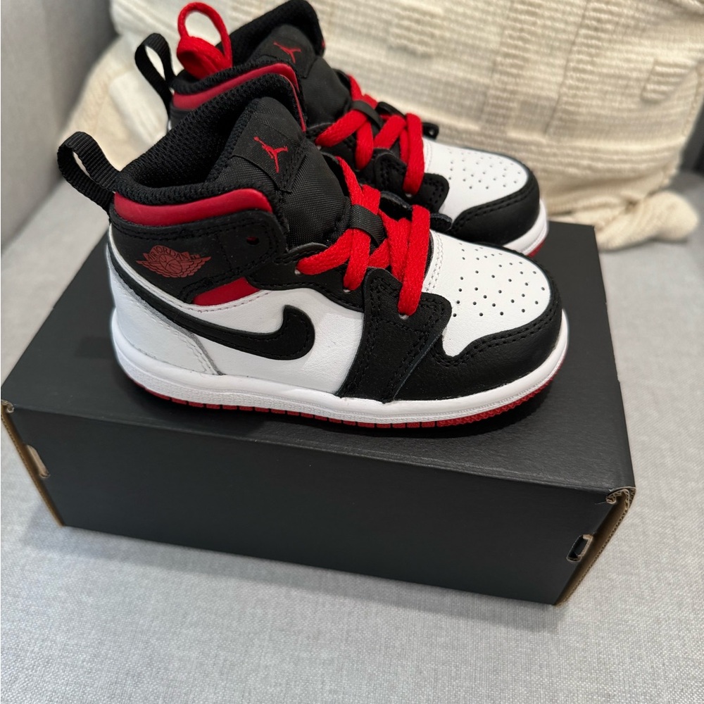 Brand new Nike black and red sneakers